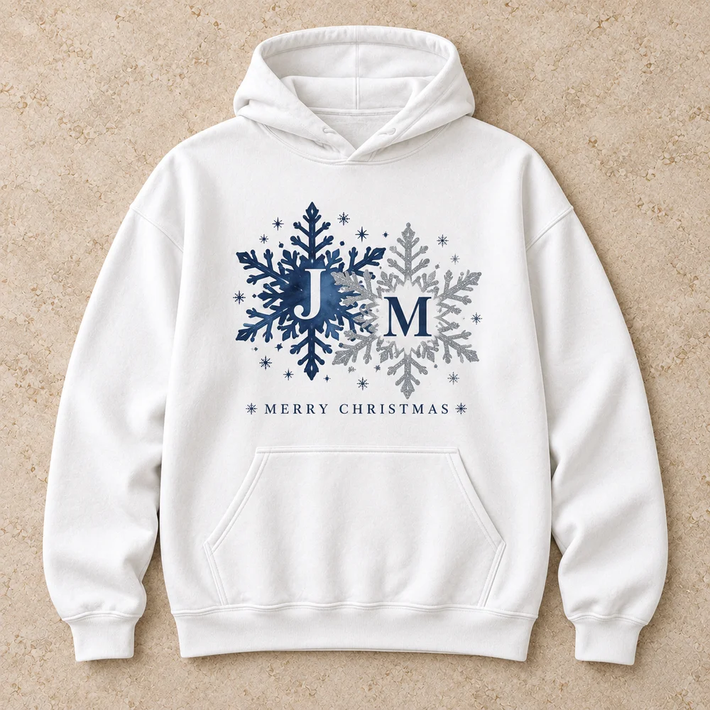 Initials in snowflakes on Heavy Blend Hoodie